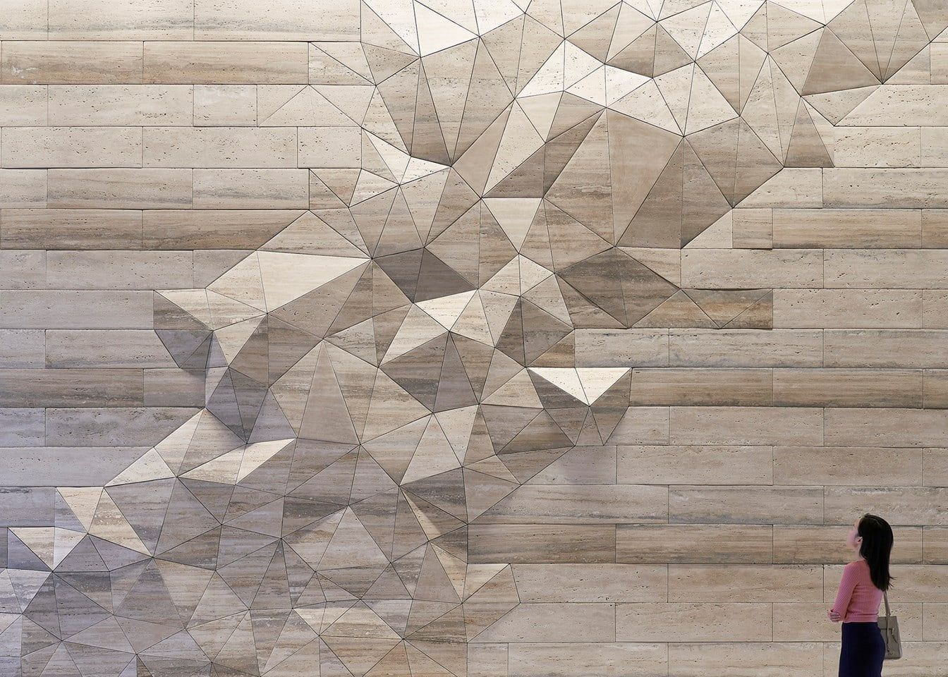 Roman travertine feature wall with geometric inlay, Two Union Square, Seattle